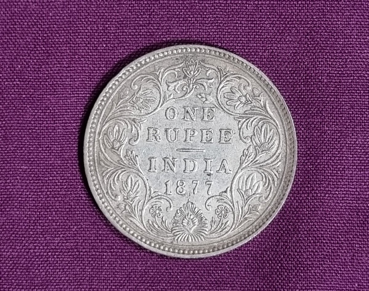 GayathriSrinath's tweet image. #QuarantineTimepass  Look what we found from the oldest cupboard while doing some cleaning to pass time - Old Coins. It felt like holding a piece of history in my hands.
1. One Rupee from 1877 at the time of  Empress Victoria