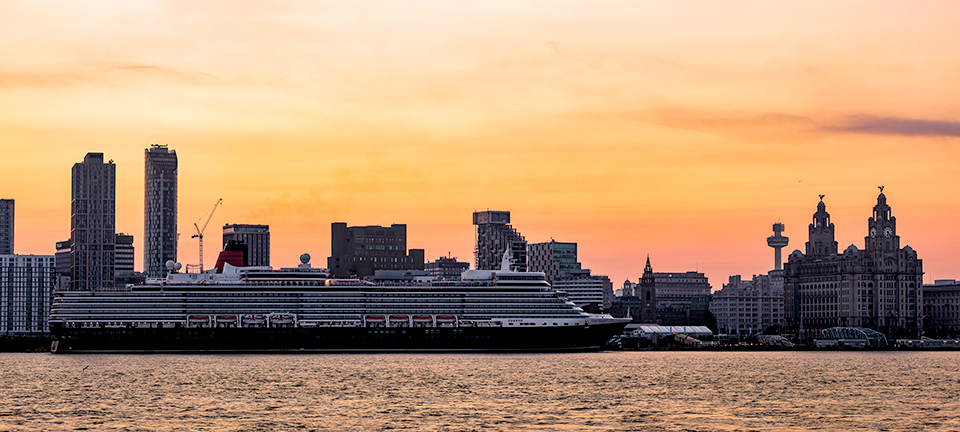 This mornings sunrise from across the river with the arrival of the @cunardline #QueenElizabeth at #CruiseLiverpool