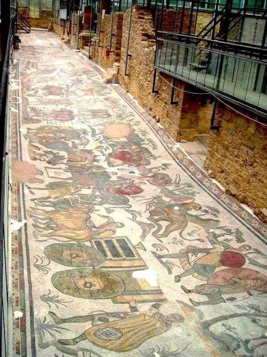 The mosaic of the Great Hunt of the Roman Villa of Casale di Piazza Armerina, Sicily.