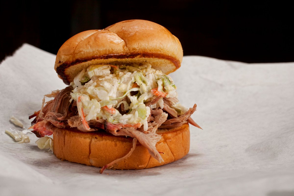 Pulled pork topped with pineapple coleslaw is the ultimate BBQ sandwich 😍