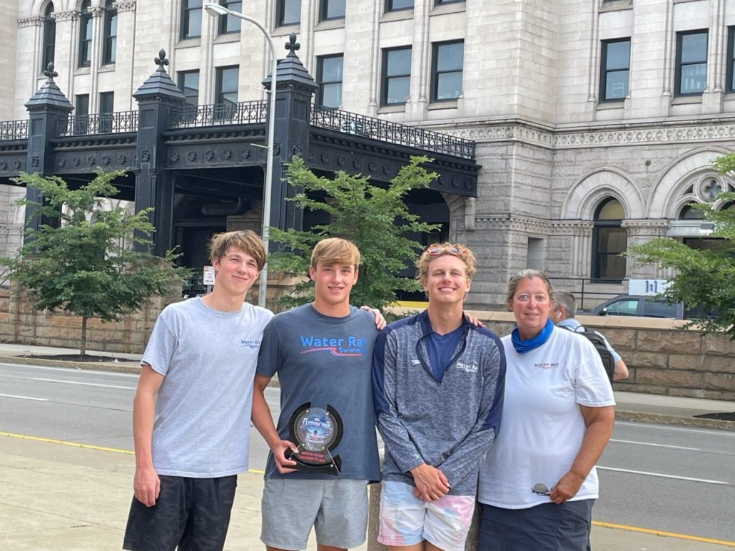 Congrats to our Water Rats Swim Team who ended the 2021 Long Course season w a bang! Please visit our website for the long list of accomplishments!
Pictured (L-R): Parker Lenoce, Riley Twiss, Emmett Adams and Coach Ellen Johnston with their Senior Zones Men’s 2nd Place Award.