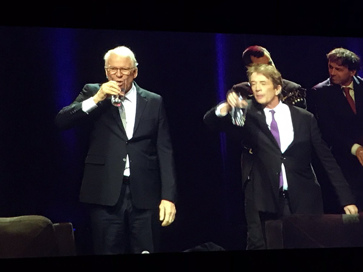 raykwon4's tweet photo. @SteveMartinToGo is hands down the funniest man on the planet - however, the man standing next to him - that white-haired buffoon on the left - is just plain rude!!! https://t.co/IkunwqX8ud