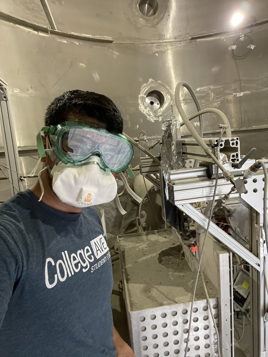 astrosebas's tweet image. Behind me is the crater formed from the impingement of a Mach 5 jet on Black Point 1 (BP-1). The environment simulated is Mars (minus the reduced gravity). We are interested in seeing how crateting occurs in different environments. #multiphaseflow #plumesurfaceinteraction #nasa