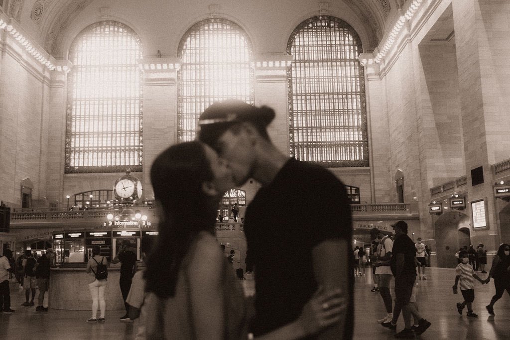 lara_spurlock's tweet photo. i swear the whole universe danced in her eyes that day. - ariana 
(Couple at Grand Central Station) https://t.co/1daQNBA6gO