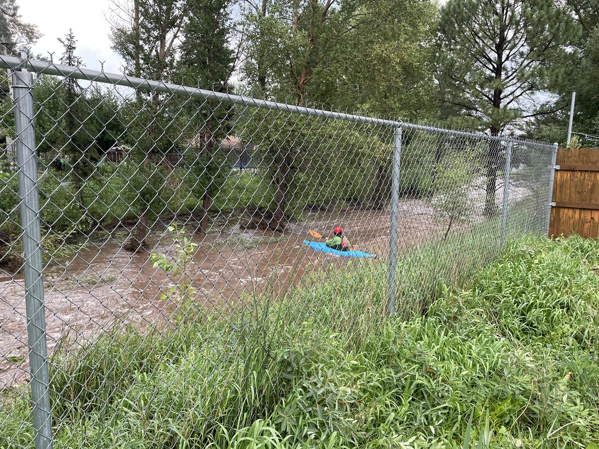 Tytolisss's tweet photo. #Flagstaff My man literally kayaking behind my house in the floods https://t.co/ZGIGk2c6yL