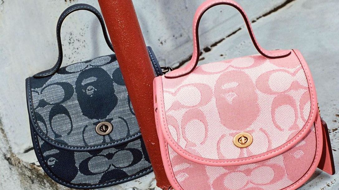 This <a href="/Coach/">Coach</a> Signature Jacquard is going to the top of our wish list! 👛 

Which color are you eyeing?