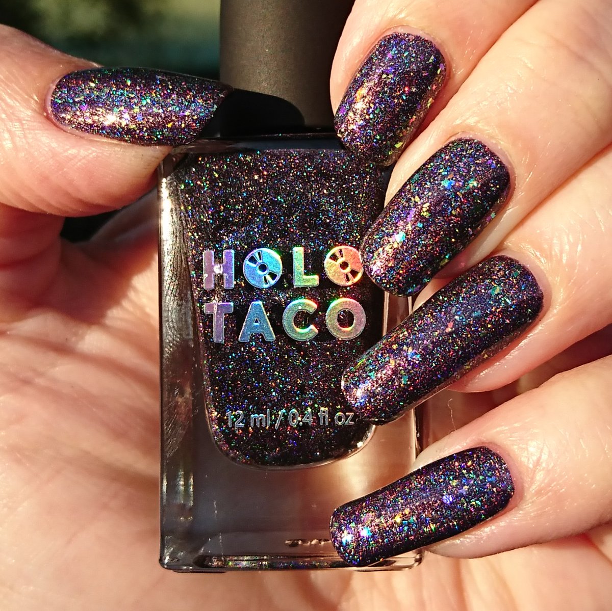delicatelie89's tweet photo. This week's polish: my nails are finally wearing polish from the limited edition 2nd anniversary #holotaco #remixcollection! check out this 🍆 linear holo polish #rainbowflood with the amazing #everythingtaco topper ✨ (fuck me, it's incredible) 💿🌮 @nailogical #paintwithsimply https://t.co/epCKBrQrFZ