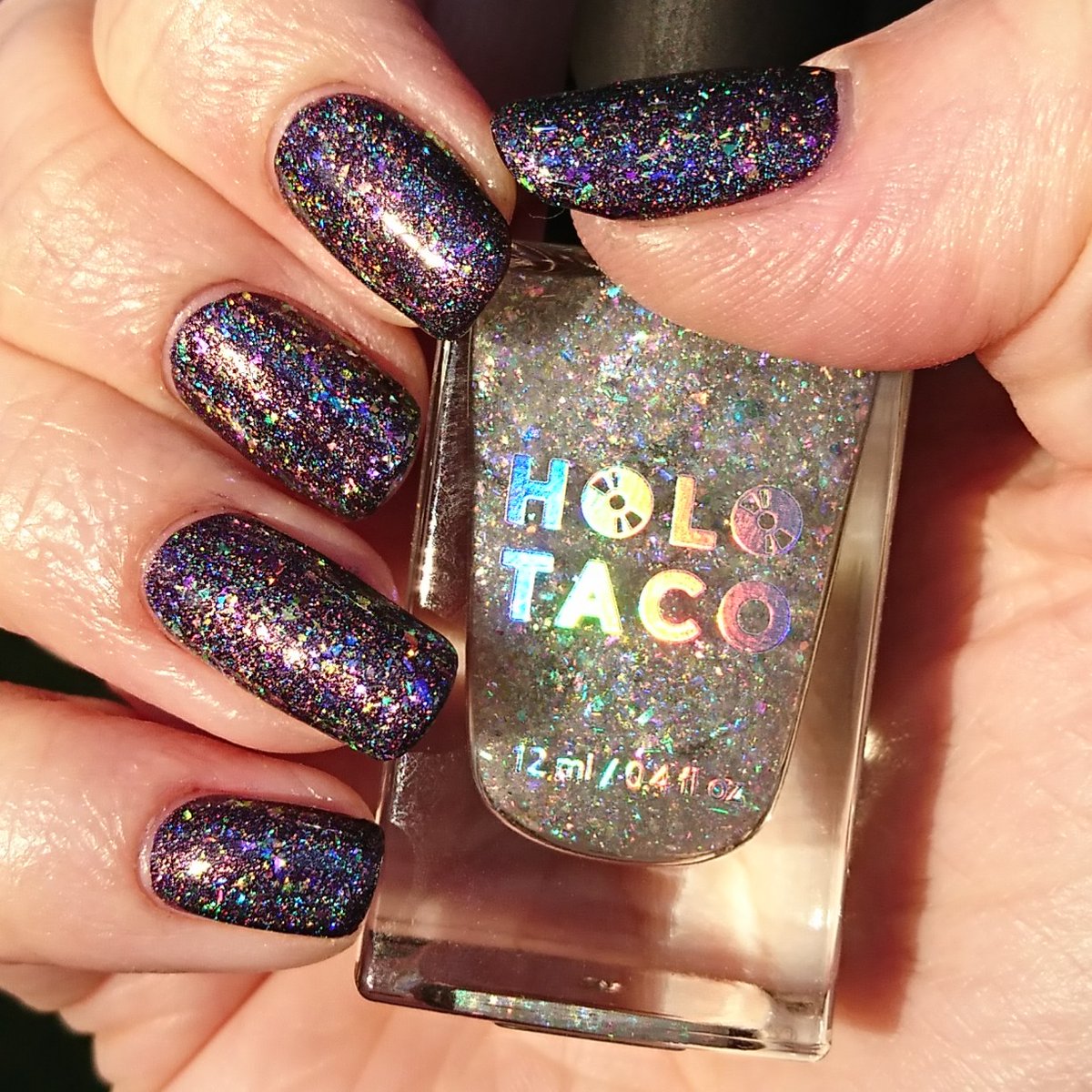 delicatelie89's tweet photo. This week's polish: my nails are finally wearing polish from the limited edition 2nd anniversary #holotaco #remixcollection! check out this 🍆 linear holo polish #rainbowflood with the amazing #everythingtaco topper ✨ (fuck me, it's incredible) 💿🌮 @nailogical #paintwithsimply https://t.co/epCKBrQrFZ