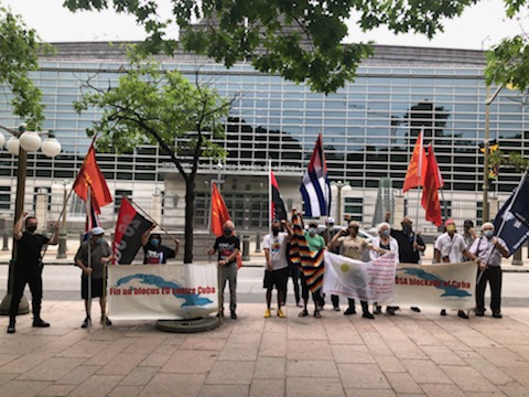 OttawaCubaCon's tweet photo. OCC picket Tuesday, August 17, 2021, @USEmbassy  to denounce the brutal US sanctions and demand #endtotheillegalblockadeofCuba, return the occupied territory in Guantanamo and abolish all unjust laws targeting Cuba.
#CubaSiBloqueoNo
#VivaCuba https://t.co/ay3hwh1oim