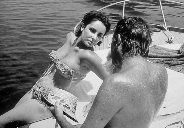 Soul__Keeper__'s tweet photo. Richard Burton &amp; Elizabeth Taylor on a boat in Ischia, Italy, during filming for the barge scenes on Cleopatra, June 1962. 
 
―
© Bert Stern https://t.co/mRUVTr69HO