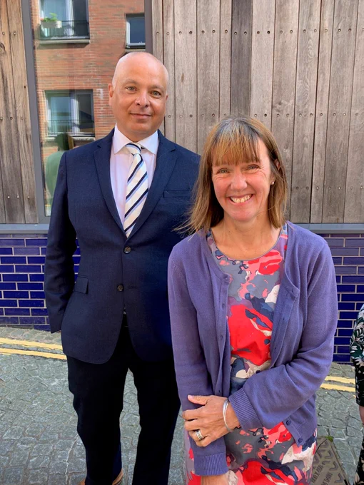 A photo of the library's director Asif Khan and Kathleen Jamie, the new Makar, in front of the SPL