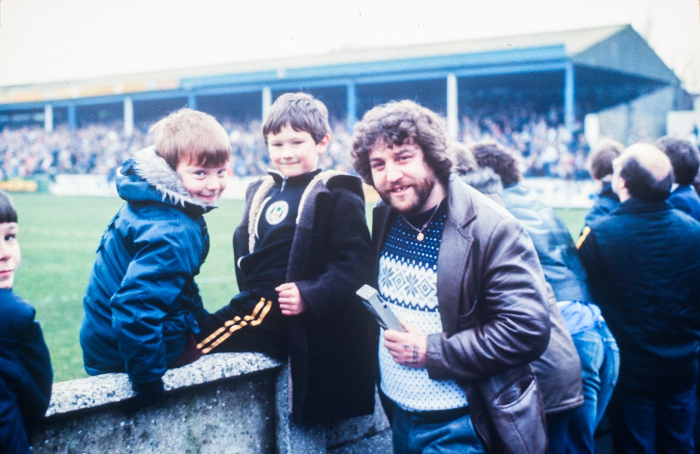PhilB1883's tweet image. Currently completing a book of 1980s Football League photos and have photo that I am proposing to use as part of the cover. It features @LaticsOfficial fan and two children. Looking to find the man and/or the kids if possible, help/info appreciated