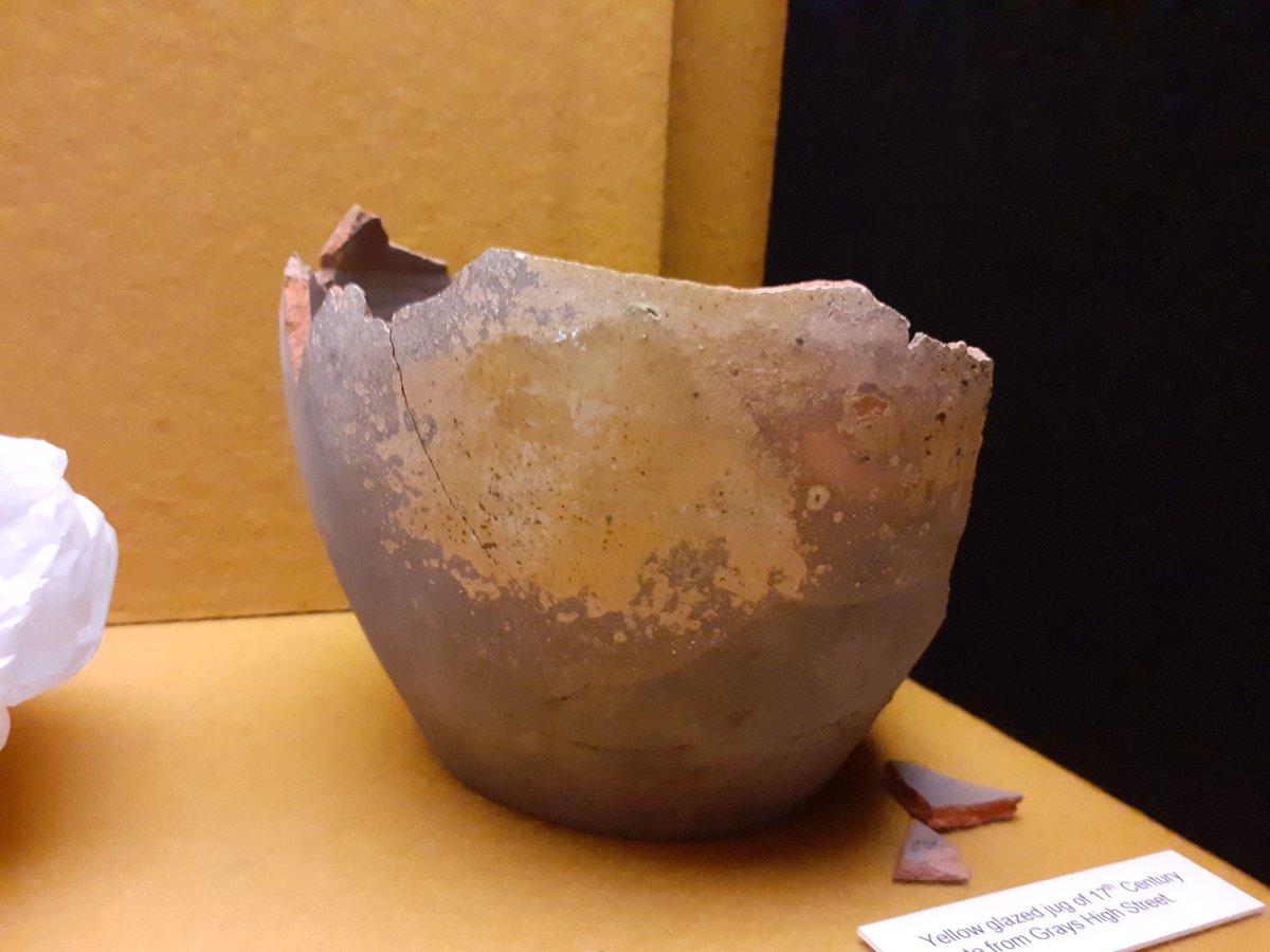 The yellow glaze holds on in places on this 17th century jug from Grays.