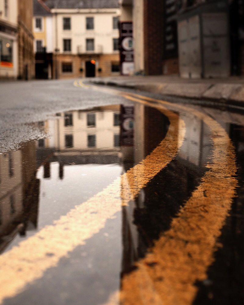 Path to the red light. Taken a few weeks ago #reflections #reflection #puddlereflection #street #streetphotography #streetphotographer #Wiltshire #devizes #doubleyellowlines #fuji #fujifilm #fujifilm_xseries #fujifilmX100f #fujistreetphotography
