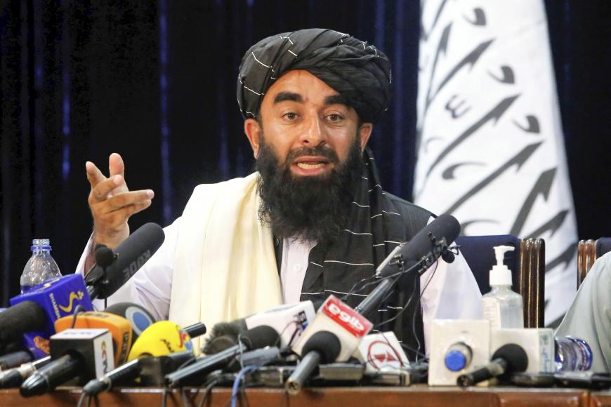Taliban spokesman Zabihullah Mujahid attends the first press conference, in Kabul, held by the Islamic militant group since it seized power in Afghanistan, August 17, 2021.  © 2021 Kyodo via AP Images