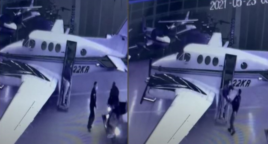 pulzo's tweet photo. Revelan video de cuando cargan coca en avión ligado a esposo de Azcárate; ¿hay 2 policías?👉https://t.co/7hCAp5xRtn https://t.co/Fl32eA3AVv