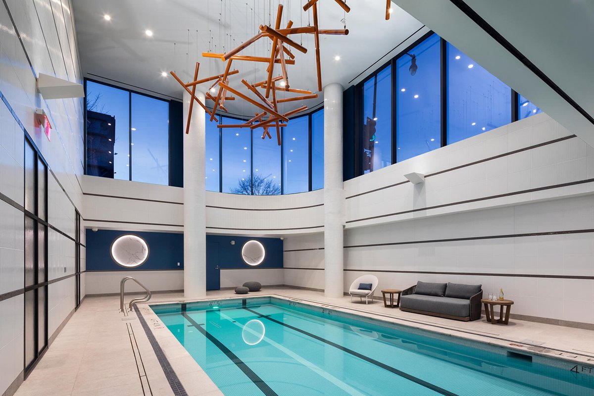 HITTContracting's tweet photo. Our #HITTBaseBuilding team recently built 950 S Capitol St, a new 13-story luxury residential apartment building along with three levels of parking below grade. The Leed Silver building features 305 residential units, a bowling alley, yoga studio, and a dog walk area. #DCCRE https://t.co/LT8BRjHS2z