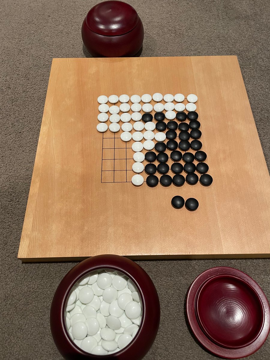 Proud of my 11 yo! She won me today like a pro in my favourite game of Go. (5 stone handicap thought 😺)