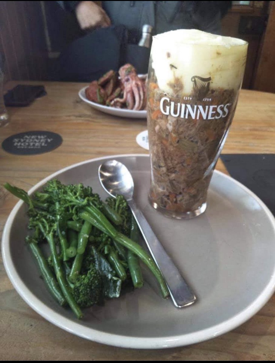 NIAMHBL's tweet photo. Shepherds pie in a Guinness glass is undoubtedly illegal and all but there also appears to be a small boiled hand on the other plate 👀 #TheHague #WTF #CallTheGuards #FineDining https://t.co/2rnusXKE1p