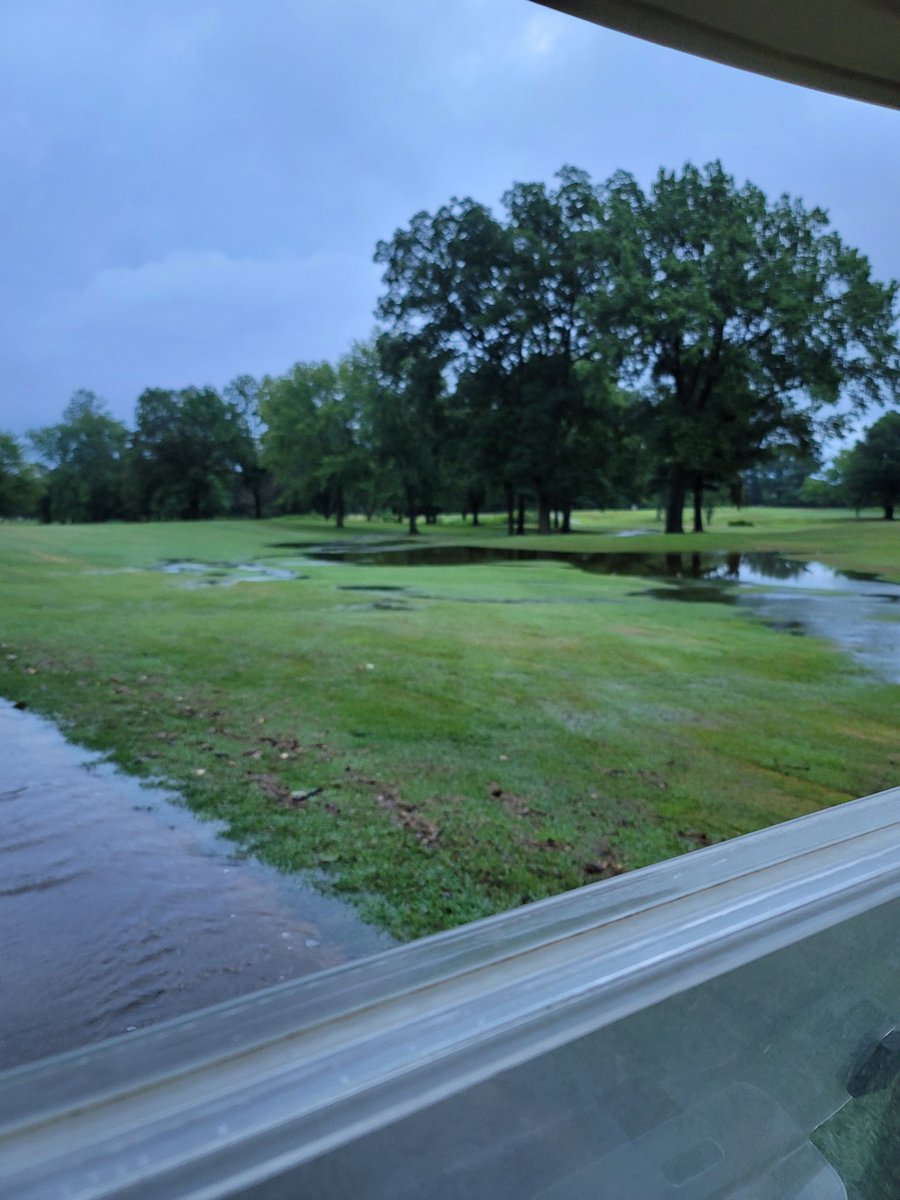 bmill_24's tweet photo. Kind of wish we could space out the rain a little better than all at once. The new river on #1 might make the tee shot a little bit harder. https://t.co/07VgwiIKUb