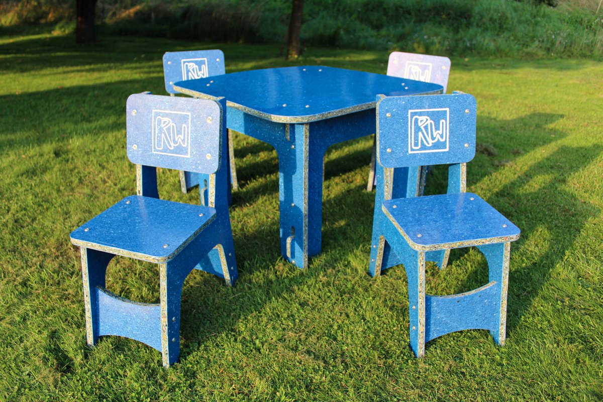 Reworked designed this children's table and chairs and made it  from speckled blue  Storm Board, weatherproof, easy to clean and great for the environment!