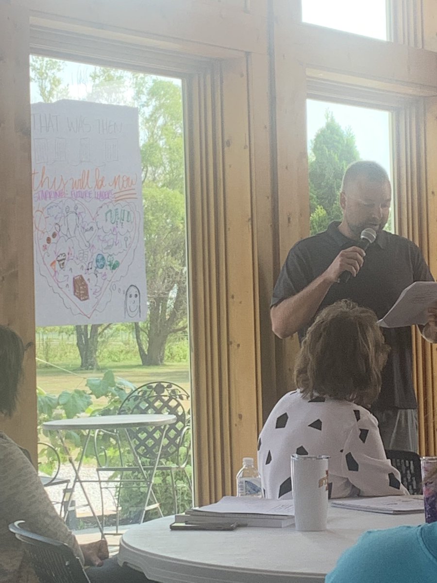 Teacher working together to@learn about Professional Learning Communities (PLCs)