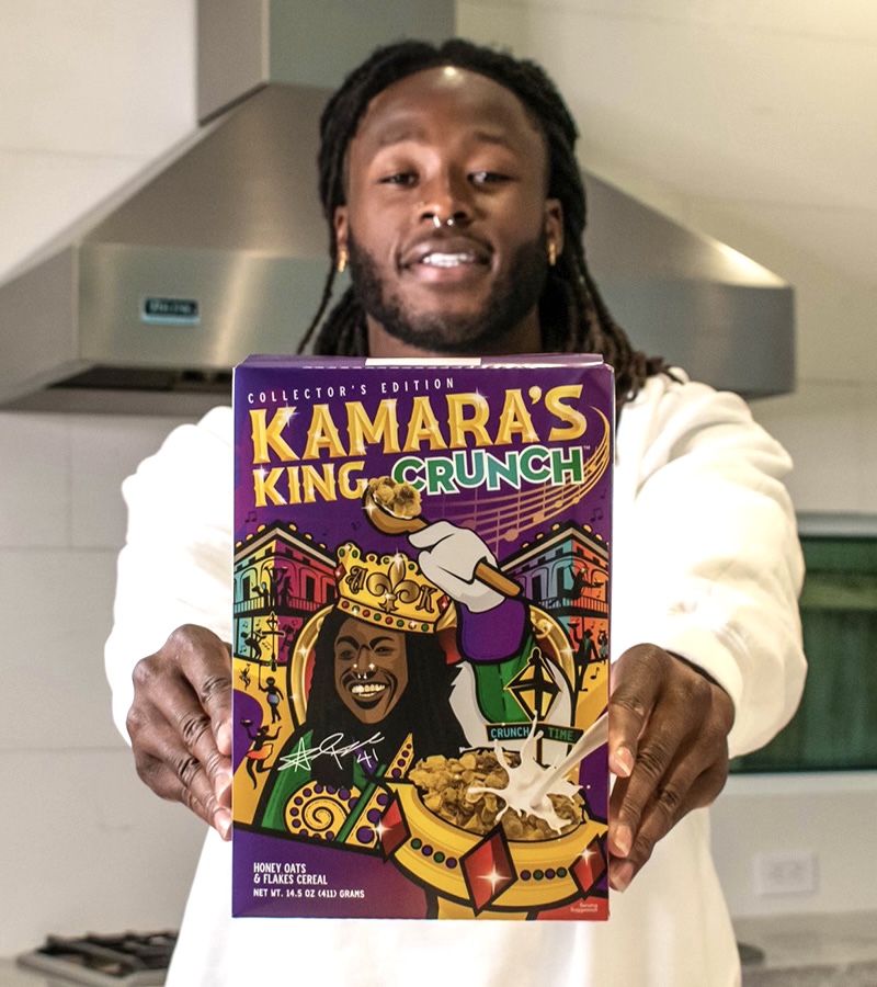 FOS's tweet photo. Introducing Kamara's King Crunch 🥣

As NFL players continue to drop breakfast cereals, @A_kamara6 unveils his honey-oat creation in true Mardi Gras fashion.

A portion of proceeds will benefit the Children's Bureau of New Orleans. https://t.co/2soz0baEKW