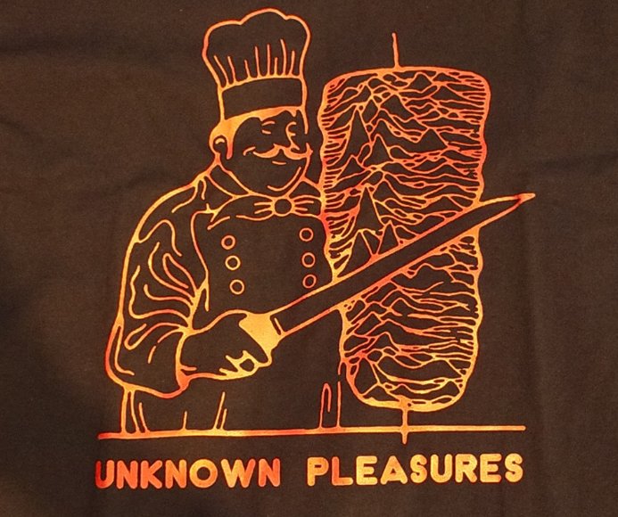 joy division shirt but it's a chef slicing shawarma