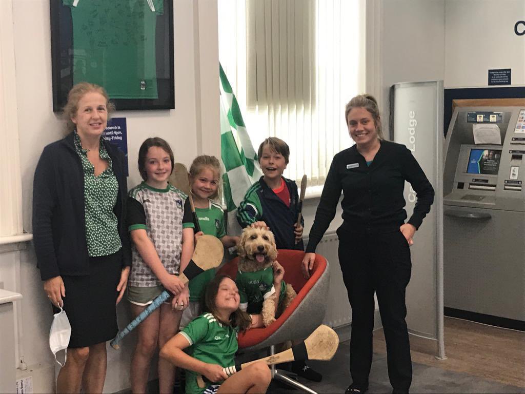 ciaraearlie's tweet photo. Challenge well and truly accepted across Limerick county here at Bank of Ireland, we are flying flags with our gorgeous pooch Lucy 🐶at #BOI Newcastlewest 💚🤍

All in support of the Limerick Team ahead of Sunday’s game💚🤍🏆#AllIrelandFinal #LimerickvCork #LuimneachAbu https://t.co/zf0zrQnT4u