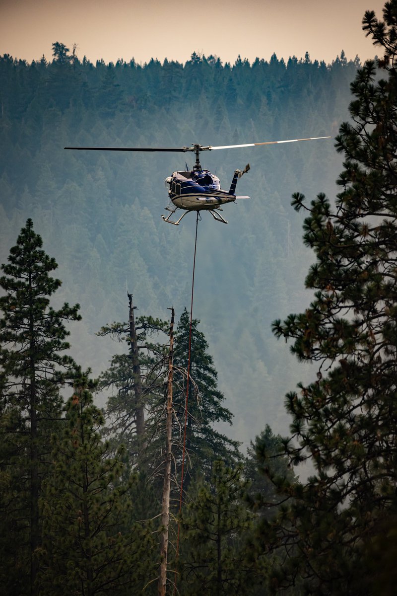 NorCal_Stringer's tweet image. Helicopter drops bucket into river along HWY-50 near Riverton, CA attempting to contain the #CaldorFire