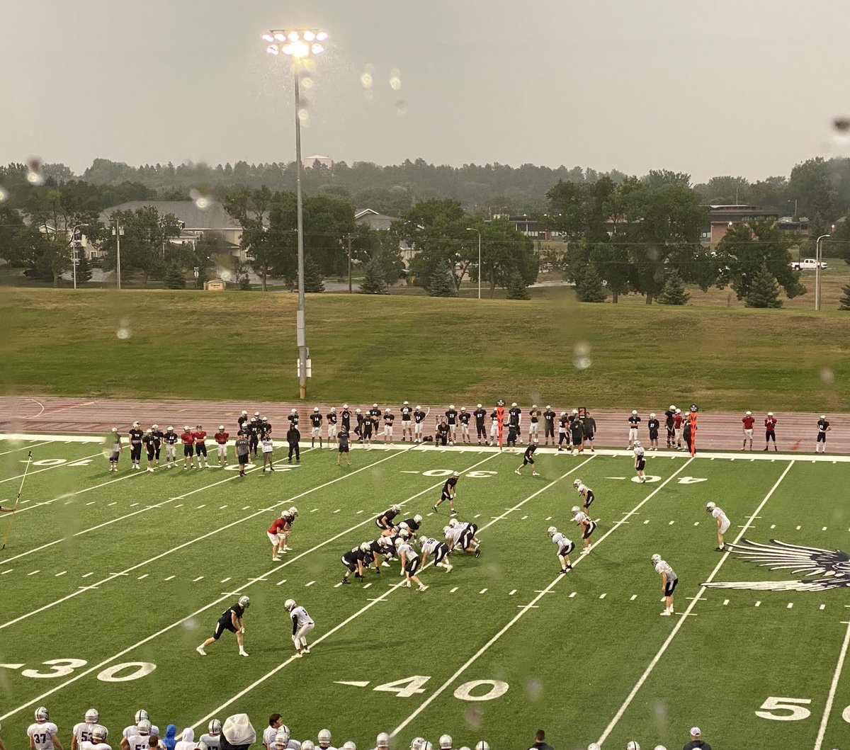CoachHickok's tweet photo. Thursday night football ✅ 
Under the lights ✅ 
Hawk weather ✅ 

Couldn’t ask for a better @BlueHawkFB scrimmage https://t.co/xh8kDlCK5I