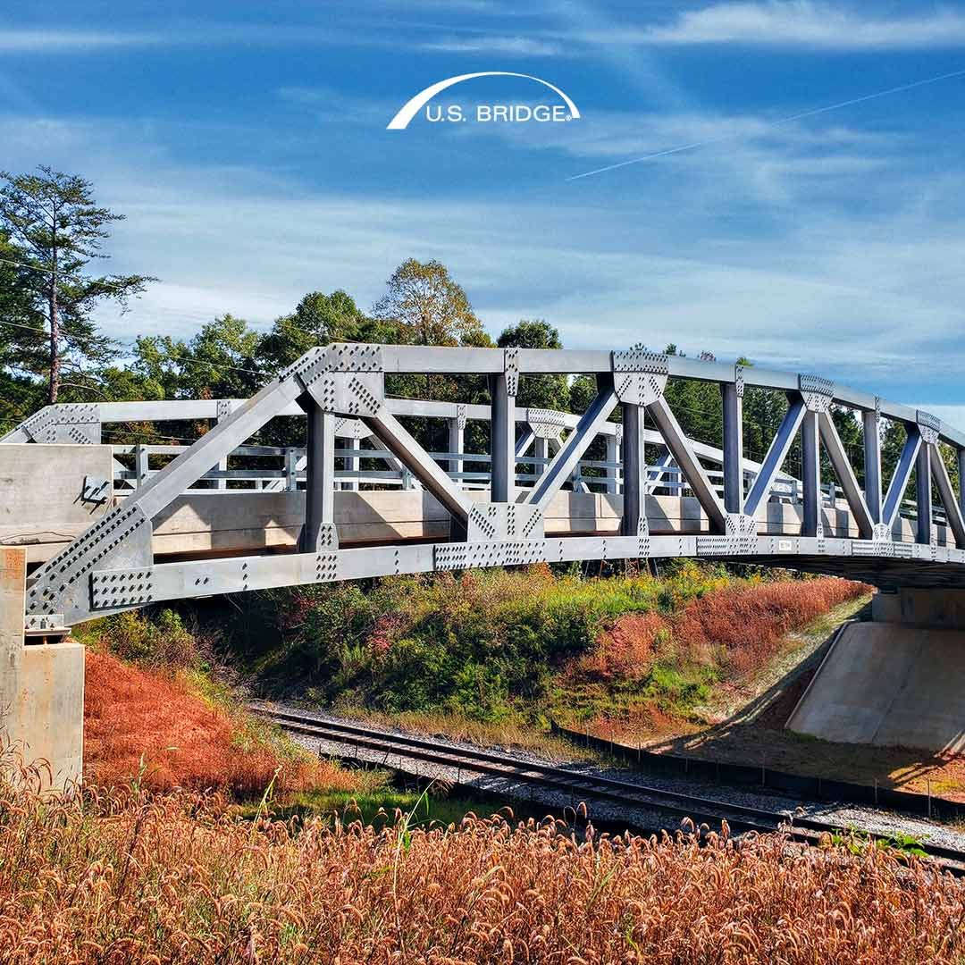 usbridge's tweet photo. When maintaining clearance over the railroad was required, Prince Edward County, VA contacted #USBridge for assistance. 🤝
The end result was a beautiful Cambridge series steel truss bridge that incorporated a cambered bottom chord that will be enjoyed for generations! 🤩 https://t.co/s0OOTktS9p