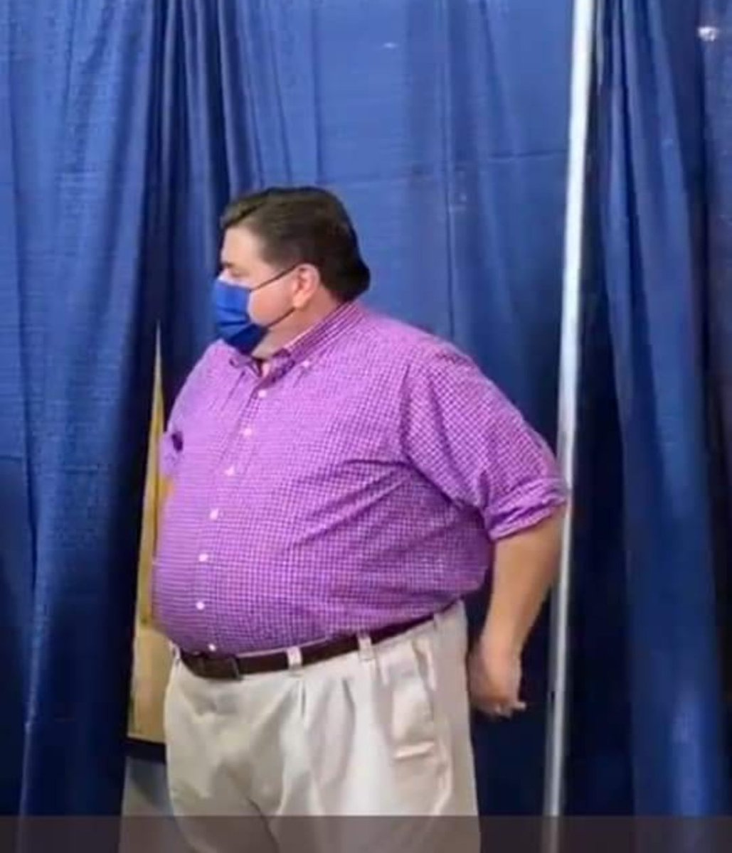 The Democrat Governor of Illinois - J.B. Pritzer - wears a mask to show you how serious he is about his health.