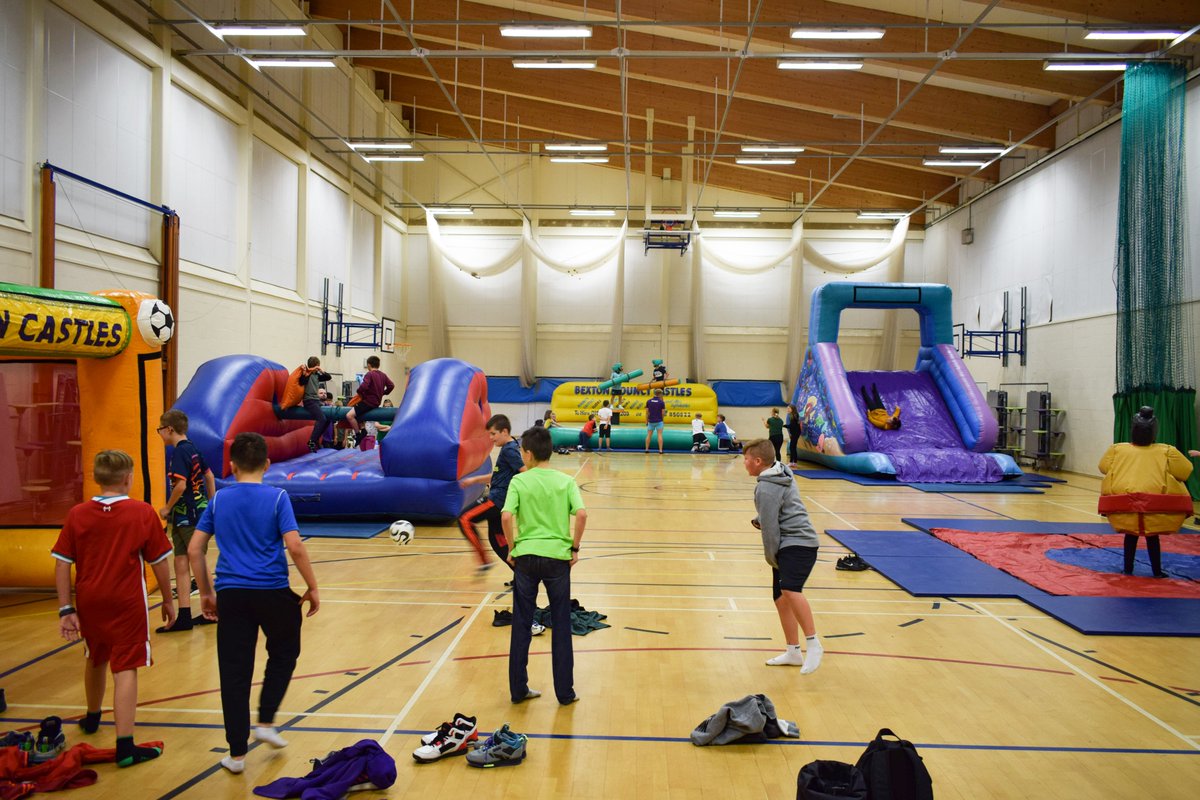 CastleRockSch's tweet photo. A great end to the week for our #CastleRockSummerSchool students in the sports hall.. #SumoSuits #Penalties #PugilSticks #Pillowfight! https://t.co/wmctVeBjYm