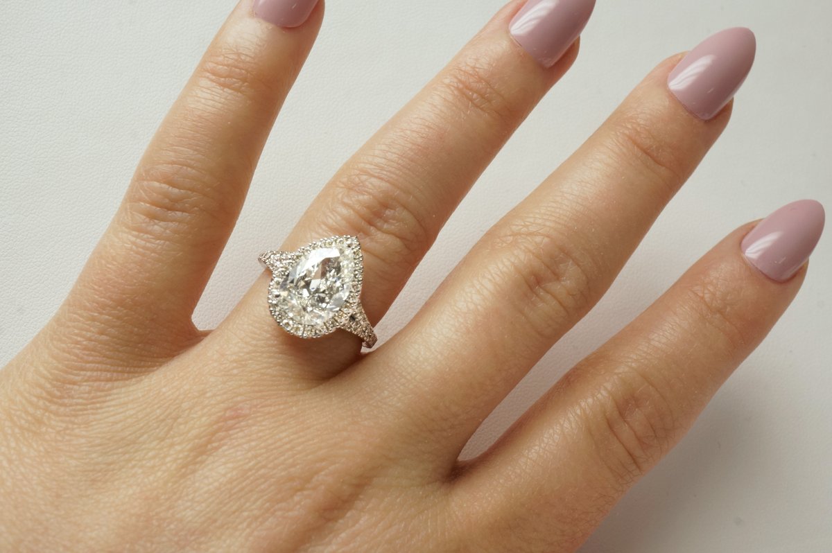 An incredible engagement ring. Over 3 carats of ice! Price is even better ;)