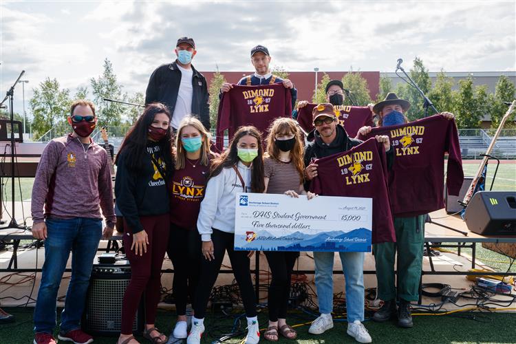 ASDschools's tweet photo. More behind-the-scene photos from our rockstar photographer at the surprise @portugaltheman concert for @DimondStudGov and the entire school for winning the #ASDAllAccess contest. 🤘🥳#AKStateFair https://t.co/YDJsSS4dkk