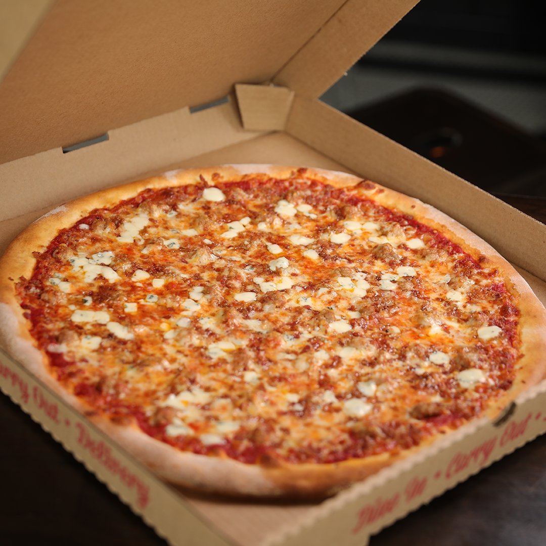 Bacon, Gorgonzola and Italian Sausage 😍 with more than 25 toppings to choose from, you can top your pizza any way you like!