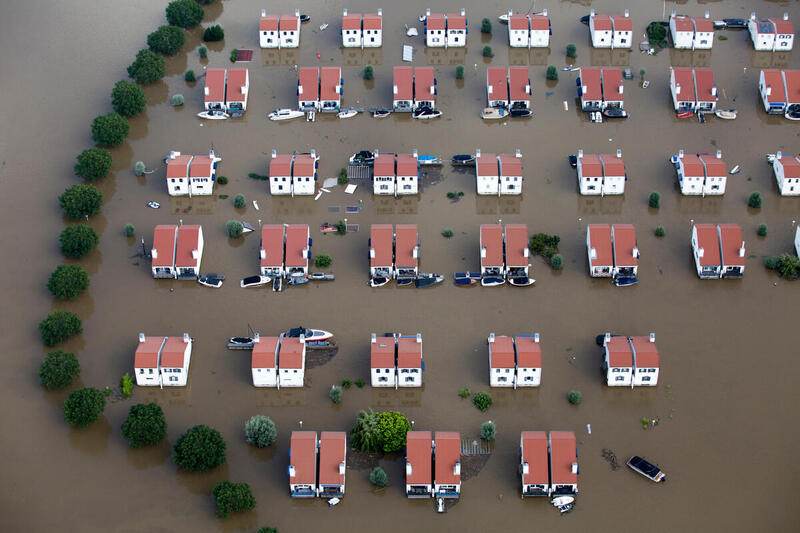 Greenpeace's tweet image. In the past month, we've seen devastating extreme weather events across the globe destroying people’s homes, and lives. This is what the climate crisis looks like. Companies and governments must stop putting profits over the lives of people and planet. We need climate action NOW!