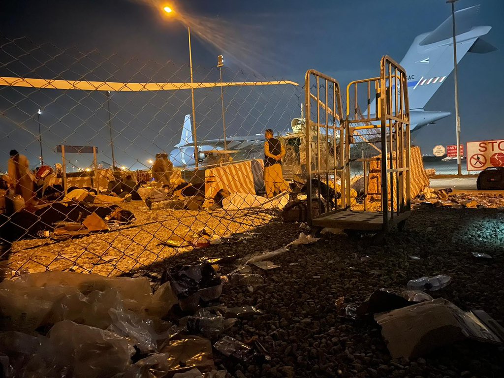 Clarissa Ward (@clarissaward) on Twitter photo Afghan evacuees try to sleep on the gravel with C17’s in the background. It’s a chilly night and incredibly loud, especially after 14 hours. One Afghan acquaintance tells me “it’s an insult to human dignity… I don’t know why the Americans are doing this.” Photo <a href="/BrentSwailsCNN/">Brent Swails</a> Afghan evacuees try to sleep on the gravel with C17’s in the background. It’s a chilly night and incredibly loud, especially after 14 hours. One Afghan acquaintance tells me “it’s an insult to human dignity… I don’t know why the Americans are doing this.” Photo <a href="/BrentSwailsCNN/">Brent Swails</a>