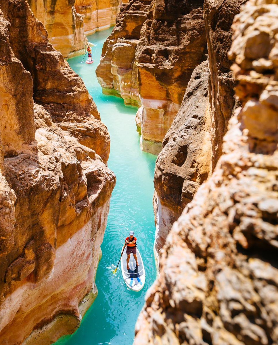 Andrew Peacock &amp; his friends Sabina and Jon #paddleboarding the spectacular #HavasuCreek while on a Colorado river trip through the Grand Canyon in Arizona! #radmvmnt #radcompany #grandcanyon #arizona #rivertrip #outdoors #keepitwild #optoutside  #kayaking #rafting #suplife