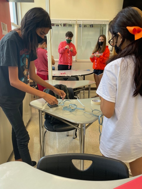 Some great collaboration was happening on this Fun Friday in AVID 9!🎯Goal: Make the longest paper chain using only 1 piece of paper, 1 pair of scissors, and tape. #WeRCLC #ThisIsAVID #TigerPride