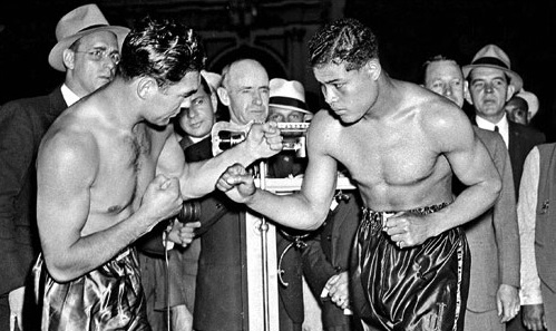 HVYWeightHeroes's tweet photo. Former champ Max Schmeling and undefeated contender Joe Louis pose at the weigh-in for their 1936 clash at Yankee Stadium. Some 60 000 fans saw the 10-to-1 underdog methodically batter Louis before scoring a clean knockout in round twelve. #Heavyweight #History #Boxing #NewYork https://t.co/ERzlXFQ6Ek