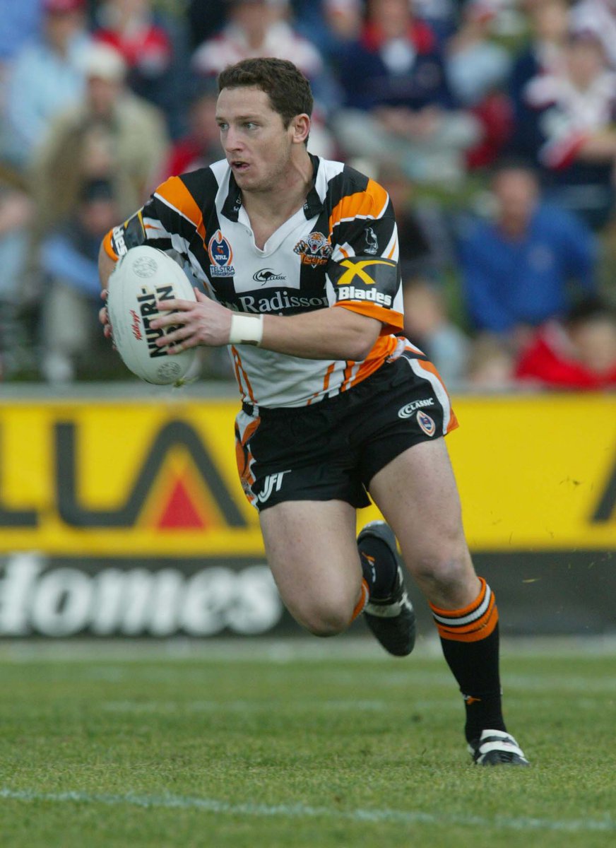 WSTFoundation's tweet photo. Wests Tigers celebrating Heritage Round today.
#WT01. Joel Caine 

On paper, the first ever Wests Tigers player 🐯 
Third highest point-scorer for the Wests Tigers (526 points: 26 tries, 211 goals)📈
NRL’s Top Points Scorer of the year (2000) 🏆 

#Heritage #WestsTigersFoundation https://t.co/2OfLoIg5pI