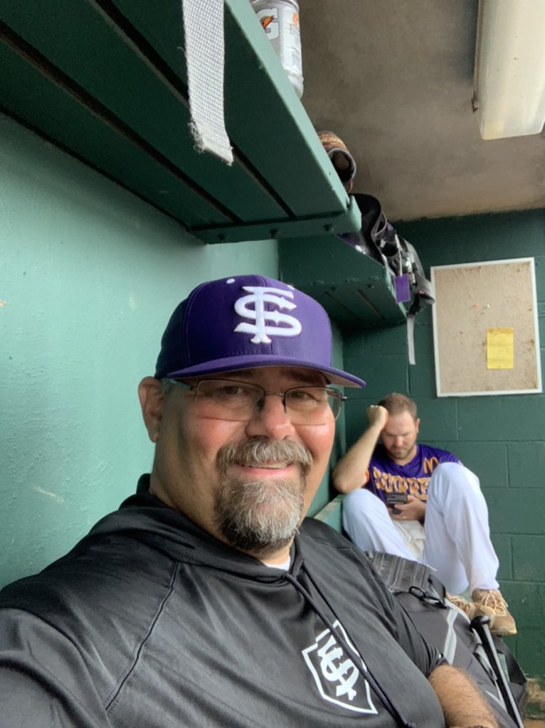 royalduke15's tweet photo. 2 pics from the summer. Rain delay in the dugout. Only true baseball people understand how nice it can be. Rainin’ in BAMA. So I did see water on my vacation. #Calm #nutsbaseball https://t.co/lI7cn0RJCd