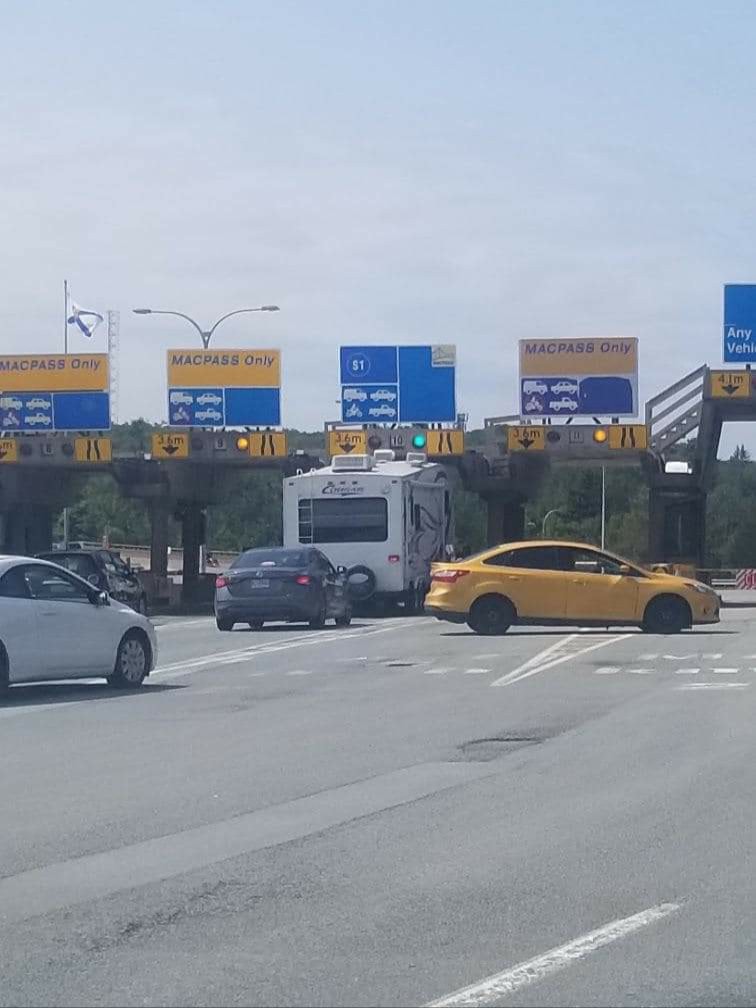 Q104Halifax's tweet photo. Q104 TRAFFIC: Reset the calendar. STUCK RV at the MacKay Bridge tolls. #Halifax  Camera with flash Jason Webber https://t.co/Fy02VgBRhD