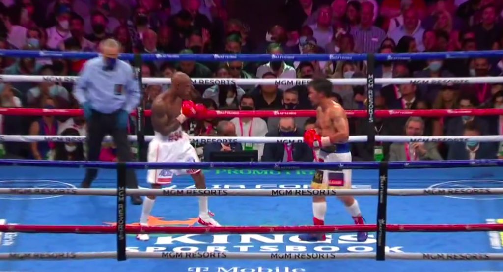enjoyGLOBE's tweet photo. Still a close fight during the #PacquiaoUgas match, both boxers throwing every punch with all they've got. It's nerve-racking even as we watch through a screen. ๐ฅต #AtinAngLaban #AtinAngMundo https://t.co/2myokYVClI