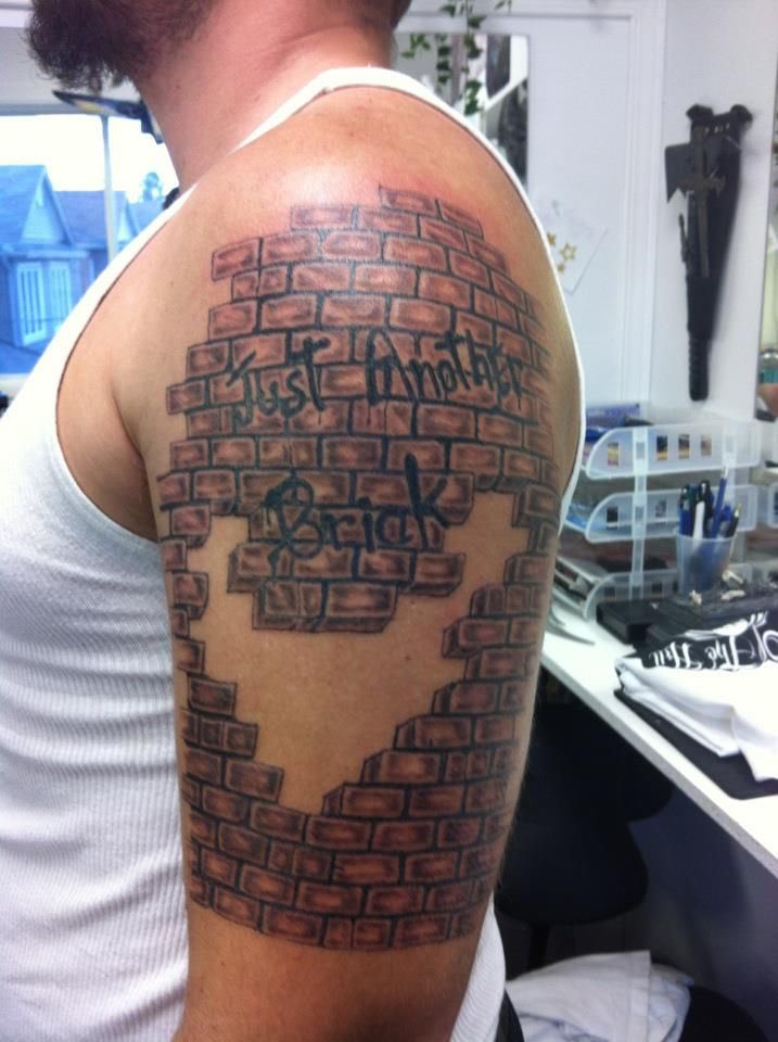 Top more than 67 brick wall tattoo best in.eteachers
