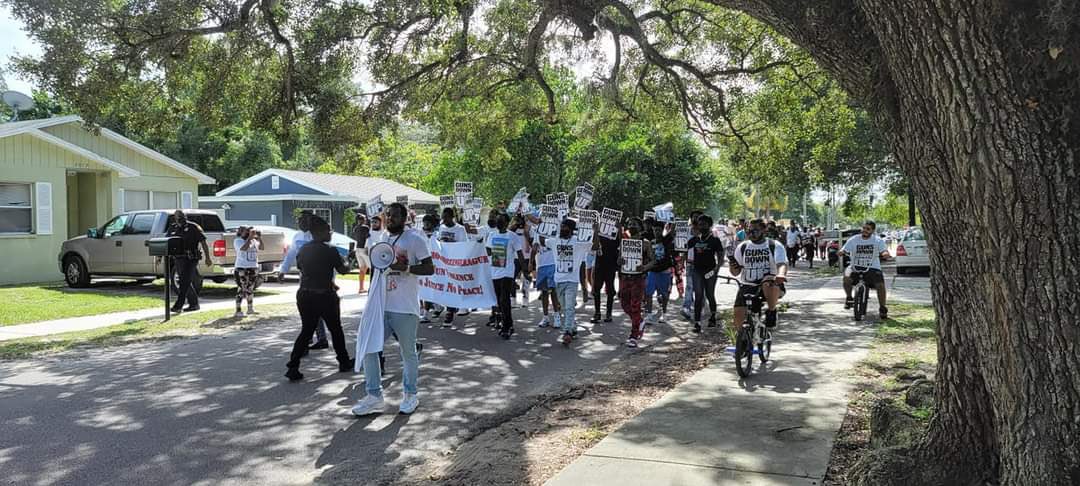 TampaPD's tweet photo. Today Tampa Police took the streets and marched with the community in the area where 4-year-old Suni Bell was murdered last Sunday in hopes of bringing awareness about her case and her killer(s) to justice. https://t.co/n1IjdYdwsP