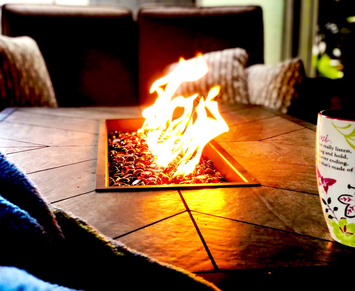 ✨How my morning is going! How’s yours? ✨ A little fire, a blanket, & a cup of coffee to start a Sunday morning is the perfect way to get the day started. #sundayvibes #morningcoffee #outdoorliving #coveredpatio #fire #quietmorning #relaxation #warmupbythefire