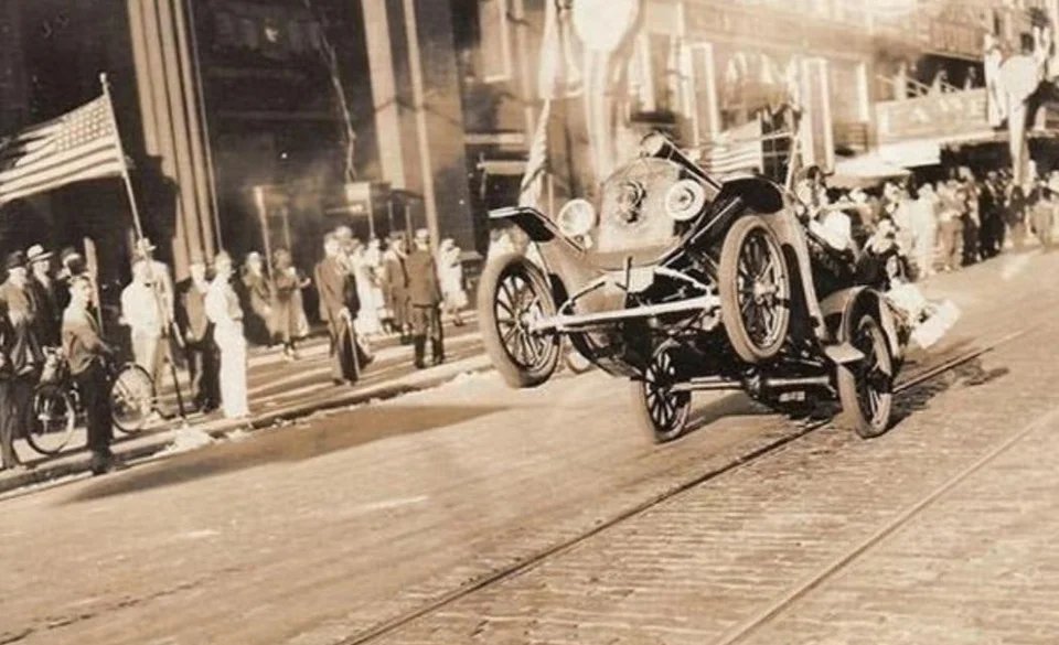 Historybench's tweet image. The first wheelie to ever be photographed 1936